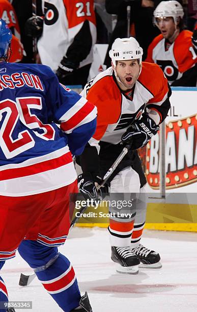 Ian LaPerriere of the Philadelphia Flyers skates against Anders Eriksson of the New York Rangers in the third period on April 9, 2010 at Madison...