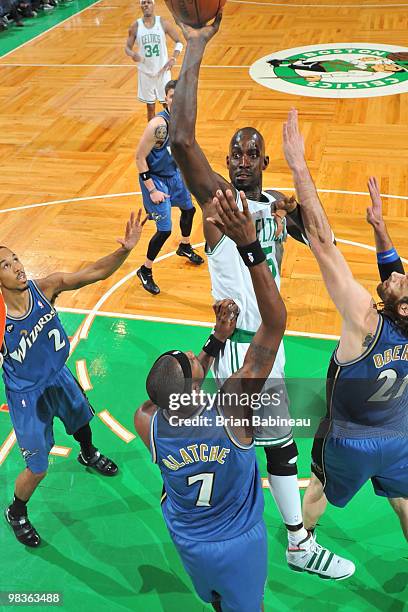 Kevin Garnett of the Boston Celtics takes the shot against Andray Blatche of the Washington Wizards on April 9, 2010 at the TD Garden in Boston,...