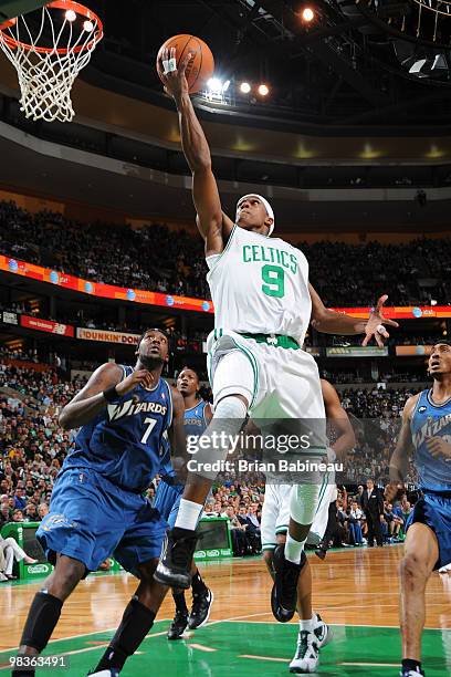 Rajon Rondo of the Boston Celtics takes the shot against James Singleton of the Washington Wizards on April 9, 2010 at the TD Garden in Boston,...