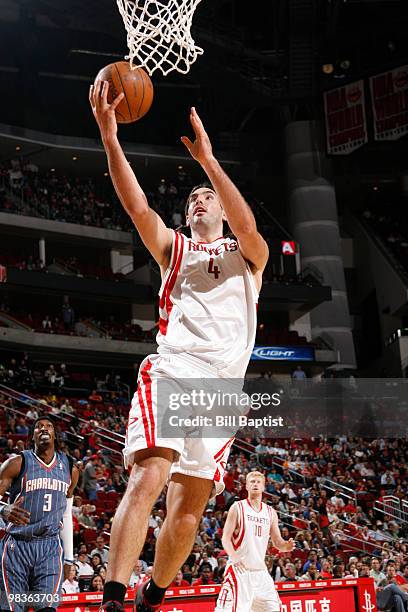 Luis Scola of the Houston Rockets shoots the ball against the Charlotte Bobcats on April 9, 2010 at the Toyota Center in Houston, Texas. NOTE TO...