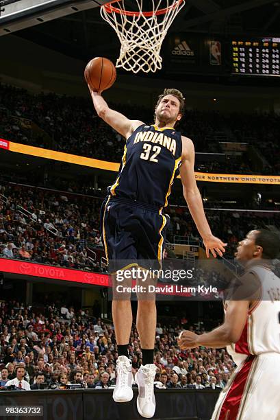 Josh McRoberts of the Indiana Pacers goes in for the dunk against the Cleveland Cavaliers on April 9, 2010 at The Quicken Loans Arena in Cleveland,...
