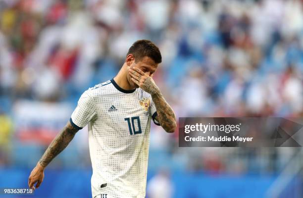 Fedor Smolov of Russia walks off dejected following the 2018 FIFA World Cup Russia group A match between Uruguay and Russia at Samara Arena on June...