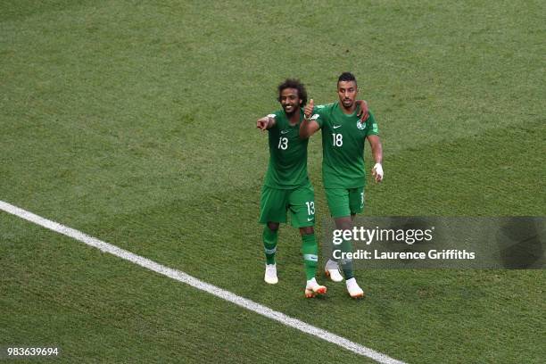 Salem Aldawsari of Saudi Arabia celebrates with teammate Yasir Alshahrani after scoring his team's second goal during the 2018 FIFA World Cup Russia...