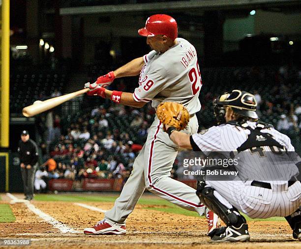Raul Ibanez of the Philadelphia Phillies singles in the eighth inning against the Houston Astros at Minute Maid Park on April 9, 2010 in Houston,...