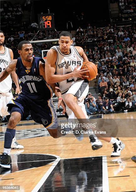 Garrett Temple of the San Antonio Spurs drives against Mike Conley of the Memphis Grizzlies on April 9, 2010 at the AT&T Center in San Antonio,...