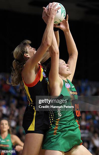 Irene van Dyk of the Magic contests with Susan Fuhrmann of the Fever for the ball during the round four ANZ Championship match between the Waikato...