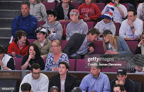 Daniel Neeson, Michael Neeson, Liam Neeson and Jennifer Ohlsson attend a game between the Philadelphia Flyers and the New York Rangers at Madison...