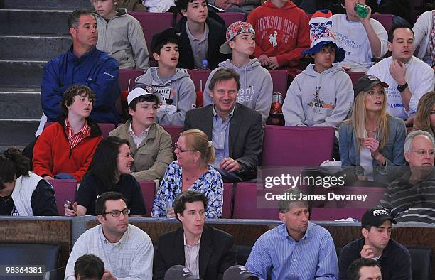 Daniel Neeson, Michael Neeson, Liam Neeson and Jennifer Ohlsson attend a game between the Philadelphia Flyers and the New York Rangers at Madison...