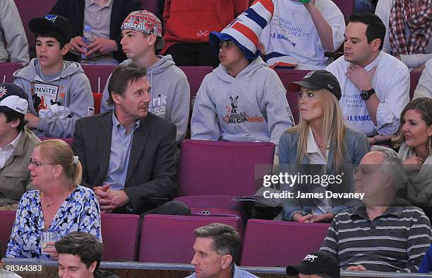 Liam Neeson and Jennifer Ohlsson attend a game between the Philadelphia Flyers and the New York Rangers at Madison Square Garden on April 9, 2010 in...