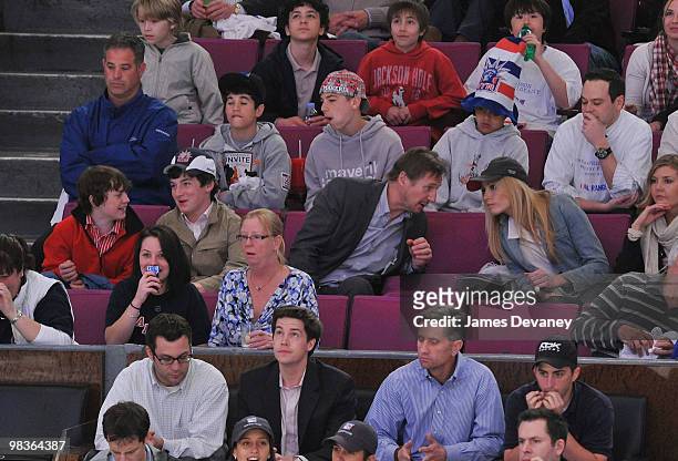 Daniel Neeson, Michael Neeson, Liam Neeson and Jennifer Ohlsson attend a game between the Philadelphia Flyers and the New York Rangers at Madison...