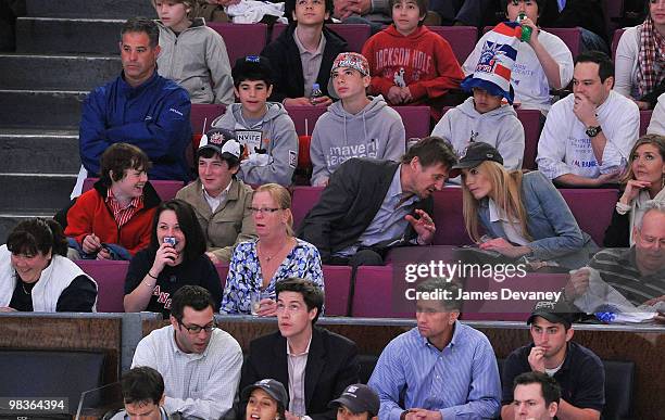 Daniel Neeson, Michael Neeson, Liam Neeson and Jennifer Ohlsson attend a game between the Philadelphia Flyers and the New York Rangers at Madison...