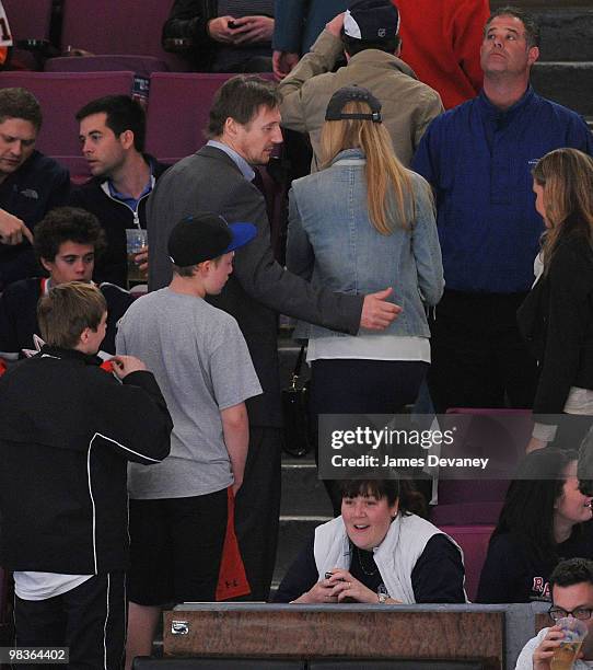 Liam Neeson and Jennifer Ohlsson attend a game between the Philadelphia Flyers and the New York Rangers at Madison Square Garden on April 9, 2010 in...