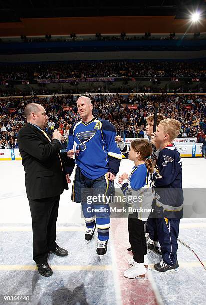 Keith Tkachuk of the St. Louis Blues talks with Chris Kerber blues radio announcer after his last home game of his career against the Anaheim Ducks...