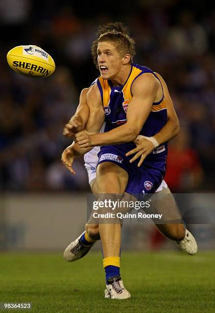 Scott Selwood of the Eagles handballs during the round three AFL match between the North Melbourne Kangaroos and the West Coast Eagles at Etihad...