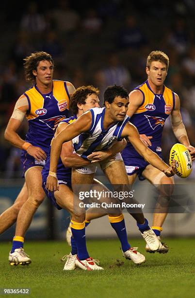 Lindsay Thomas of the Kangaroos is tackled during the round three AFL match between the North Melbourne Kangaroos and the West Coast Eagles at Etihad...