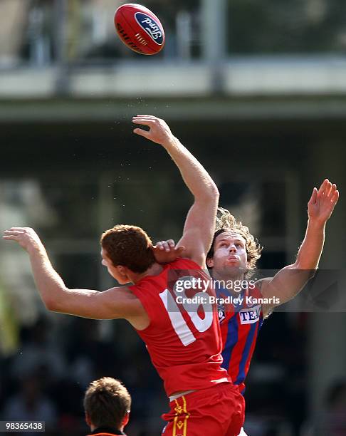 Rory Thompson of the Gold Coast and David Fanning of Port Melbourne compete for the ball during the round one VFL match between the Gold Coast...