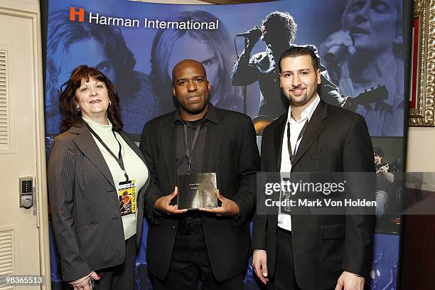 Mary Simneau, Photographer Earl Douglas Jr., and Zia Elia attend Earl Douglas Jr's Black Rock Volume 1 launch presented by Harman Kardon at Hard Rock...