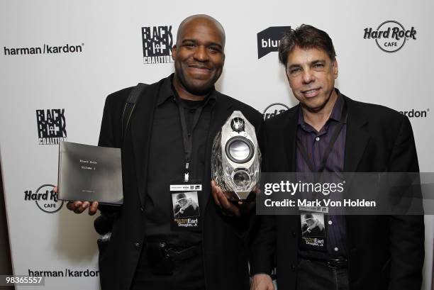 Photographer Earl Douglas Jr. And Harmon Kardon's Joe Pullin attend Earl Douglas Jr's Black Rock Volume 1 launch presented by Harman Kardon at Hard...