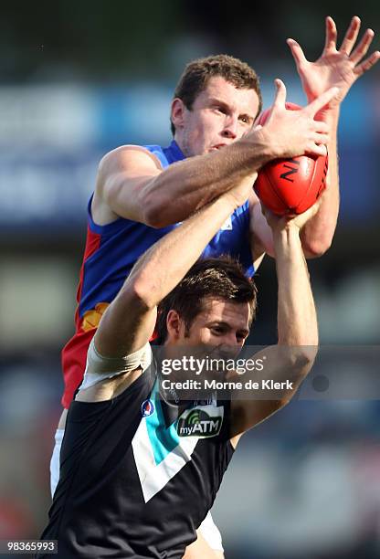 Steven Salopek of the Power and Matthew Leuenberger of Lions compete for the ball during the round three AFL match between Port Adelaide Power and...