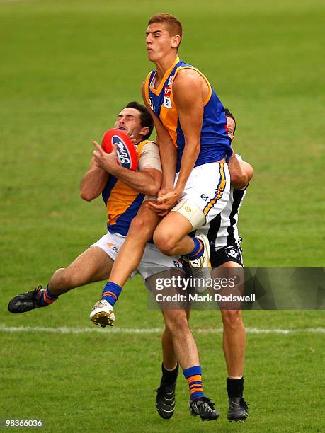 Matthew Cravino of Williamstown marks ahead of Liam Jones of Williamstown during the round one VFL match between Collingwood and Williamstown at...