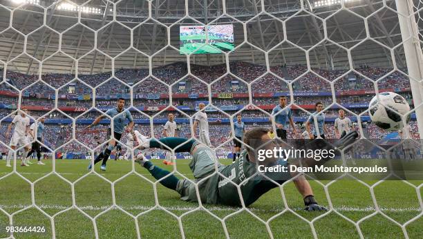 Denis Cheryshev of Russia scores an own goal deflecting Diego Laxalt of Uruguay's shot to put Uruguay infront 2-0 during the 2018 FIFA World Cup...