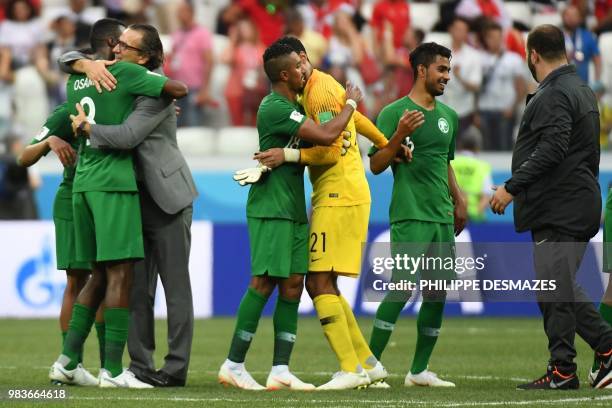 Saudi Arabia's players celebrate winning the Russia 2018 World Cup Group A football match between Saudi Arabia and Egypt at the Volgograd Arena in...