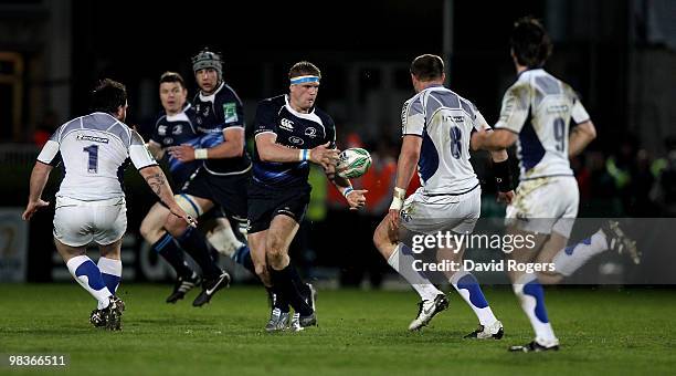 Jamie Heaslip of Leinster passes the ball during the Heinken Cup quarter final match between Leinster and Clermont Auvergne at the RDS on April 9,...