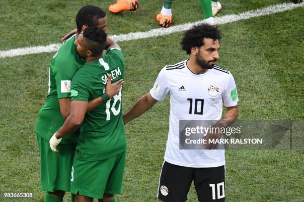 Egypt's forward Mohamed Salah reacts following his team's defeat during the Russia 2018 World Cup Group A football match between Saudi Arabia and...