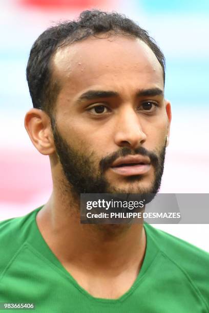 Saudi Arabia's midfielder Abdullah Otayf poses for a photo before the Russia 2018 World Cup Group A football match between Saudi Arabia and Egypt at...