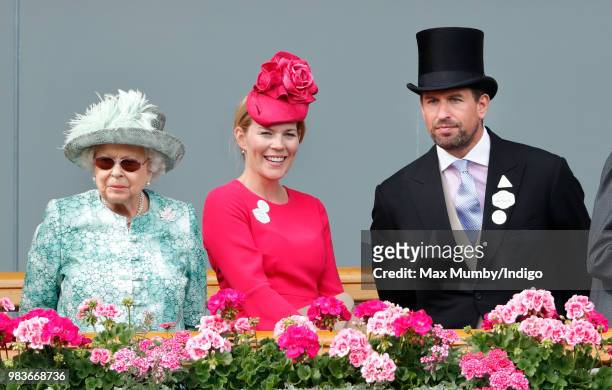 Queen Elizabeth II, Autumn Phillips and Peter Phillips attend day 5 of Royal Ascot at Ascot Racecourse on June 23, 2018 in Ascot, England.