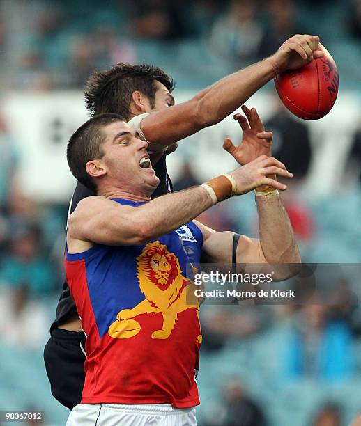 Jonathan Brown of the Lions competes with Steven Salopek of the Power during the round three AFL match between Port Adelaide Power and Brisbane Lions...