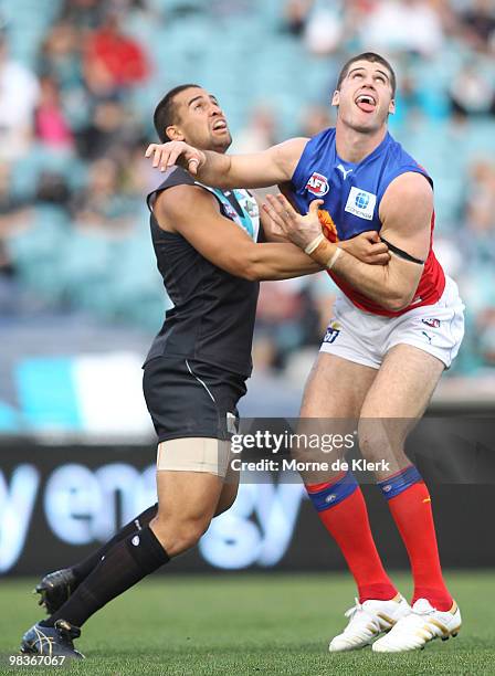 Alipate Carlile of the Power and Jonathan Brown of the Lions compete for the ball during the round three AFL match between Port Adelaide Power and...