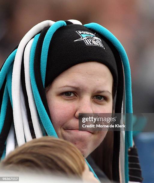 Power fans show her support during the round three AFL match between Port Adelaide Power and Brisbane Lions at AAMI Stadium on April 10, 2010 in...