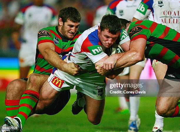 Steve Simpson of the Knights is tackled during the round five NRL match between the South Sydney Rabbitohs and the Newcastle Knights at Bluetongue...