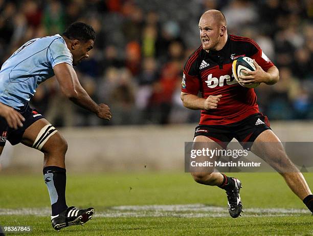 Ben Franks of the Crusaders is tackled by Wycliff Palu of the Waratahs during the round nine Super 14 match between the Crusaders and the Waratahs...