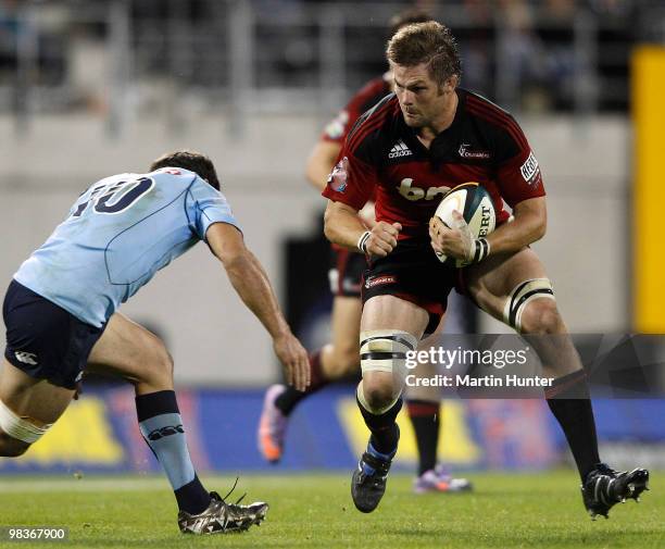 Richie McCaw of the Crusaders confronts Daniel Halangahu of the Waratahs during the round nine Super 14 match between the Crusaders and the Waratahs...