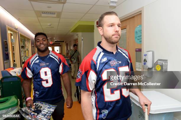 Boston Cannons Trevor Baptiste and Kyle Denhoff visit the kids at Boston Children's Hospital June 25, 2018 in Boston, Massachusetts.