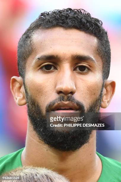 Saudi Arabia's midfielder Salman Al-Faraj poses for a photo before the Russia 2018 World Cup Group A football match between Saudi Arabia and Egypt at...