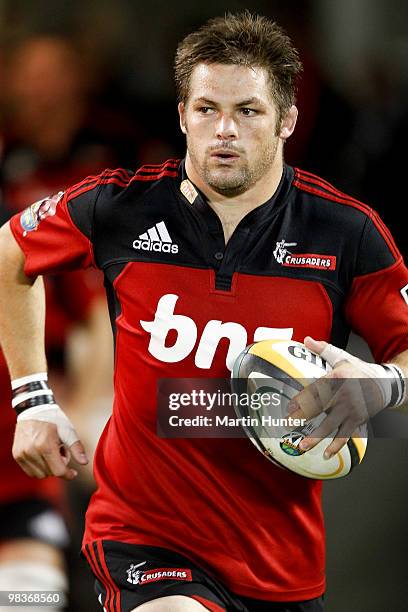 Richie McCaw of the Crusaders runs onto the field during the round nine Super 14 match between the Crusaders and the Waratahs AMI Stadium on April...