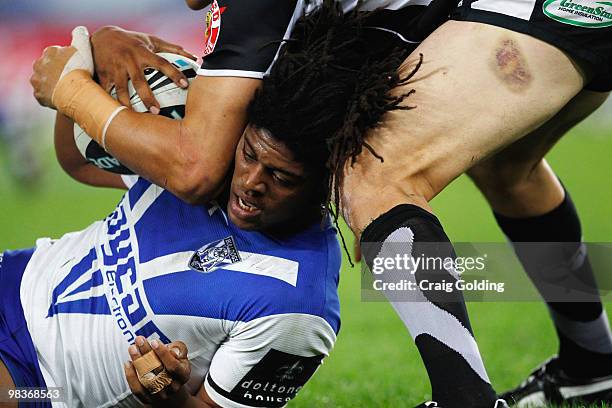 Jamal Idris of the Bulldogs is tackled during the round five NRL match between the Canterbury Bulldogs and the Warriors at ANZ Stadium on April 10,...