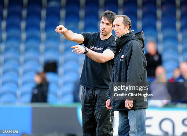 Director of Rugby Brendon Venter and forwards coach Alex Sanderson of Saracens during the Guinness Premiership match between Sale Sharks and Saracens...