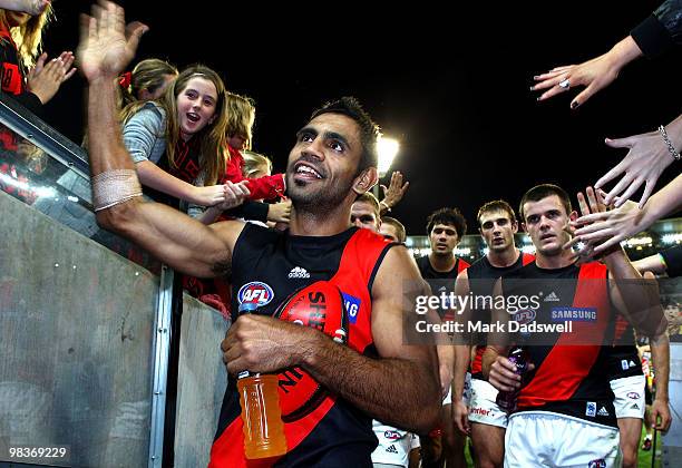 Nathan Lovett-Murray of the Bombers celebrates with fans after his team won the round three AFL match between the Carlton Blues and the Essendon...