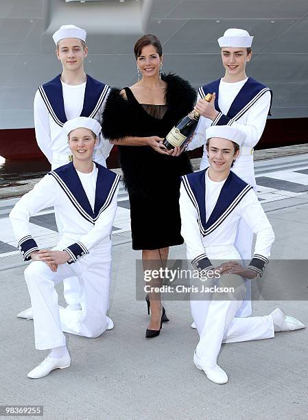 Ballerina Darcey Bussell poses with members of the Royal Ballet School dressed as sailors as she is name as 'Godmother' to P&O's latest Cruise Ship...