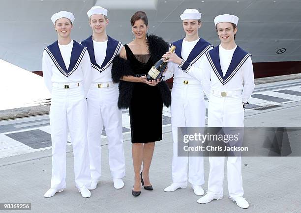 Ballerina Darcey Bussell poses with members of the Royal Ballet School dressed as sailors as she is name as 'Godmother' to P&O's latest Cruise Ship...