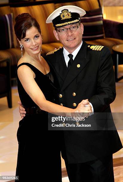 Ballerina Darcey Bussell poses for a photograph with Captain Keith Dowds as she is named as 'Godmother' to P&O's latest cruise ship Azura at Ocean...