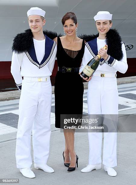 Ballerina Darcey Bussell poses with members of the Royal Ballet School dressed as sailors as she is name as 'Godmother' to P&O's latest Cruise Ship...