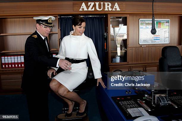 Ballerina Darcey Bussell poses for a photograph on the bridge with Captain Keith Dowds as she is named as 'Godmother' to P&O's latest cruise ship...