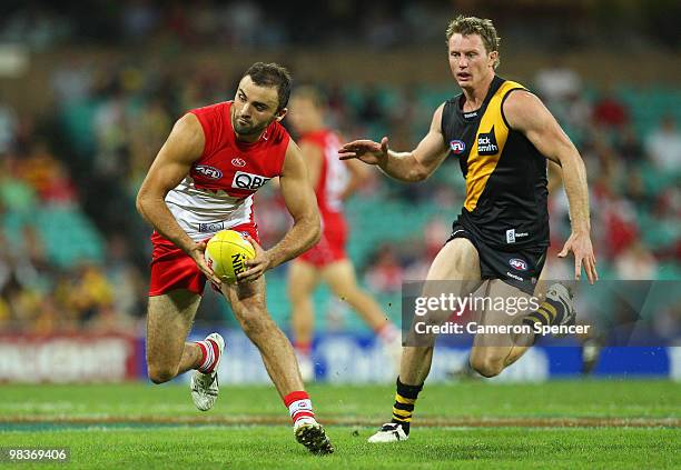 Rhyce Shaw of the Swans runs the ball during the round three AFL match between the Sydney Swans and the Richmond Tigers at Sydney Cricket Ground on...