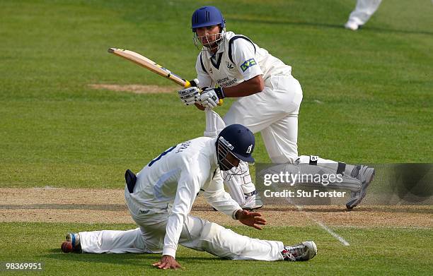 Yorkshire batsman Azmal Shazad works the ball past fielder Varun Chopra during the 2nd day of the Division One LV County Championship match between...