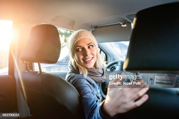 woman driving a car - reversing stock pictures, royalty-free photos & images